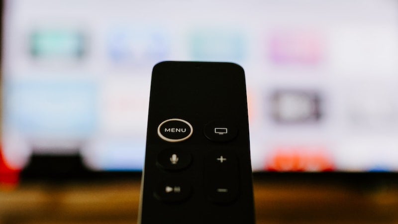 Remote in front of a smart TV